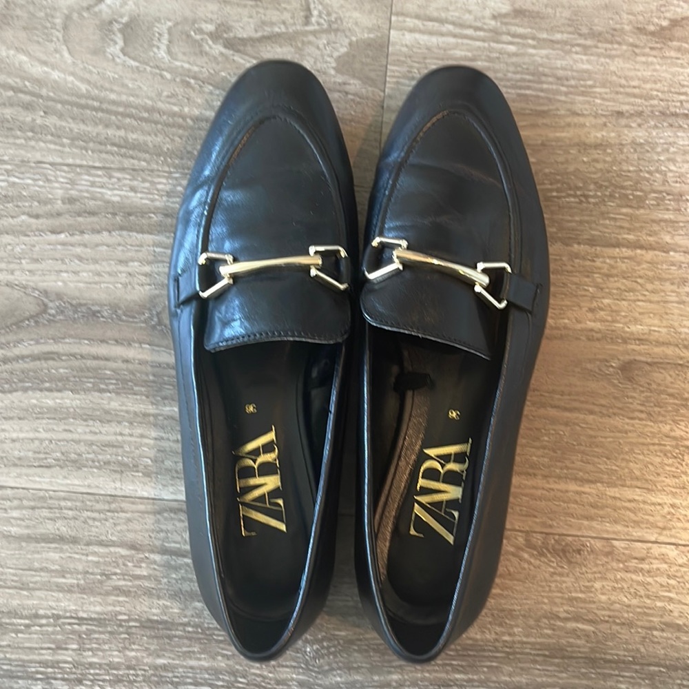 Zara black with gold hardware loafers in size 36/6 woman’s.